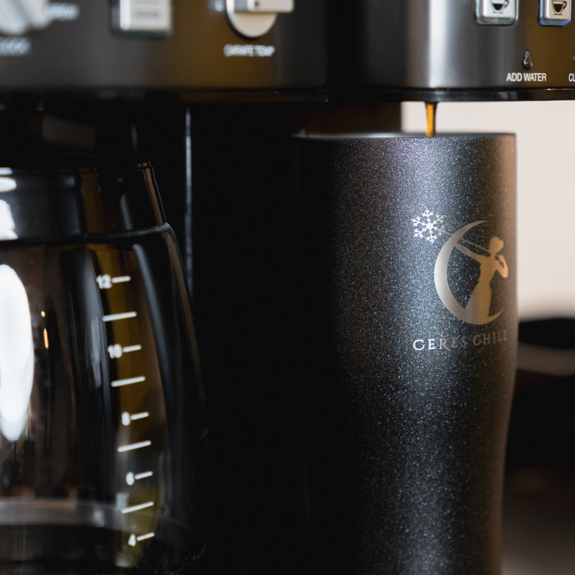 A black Chiller from Ceres Chill being filled with brewed tea.