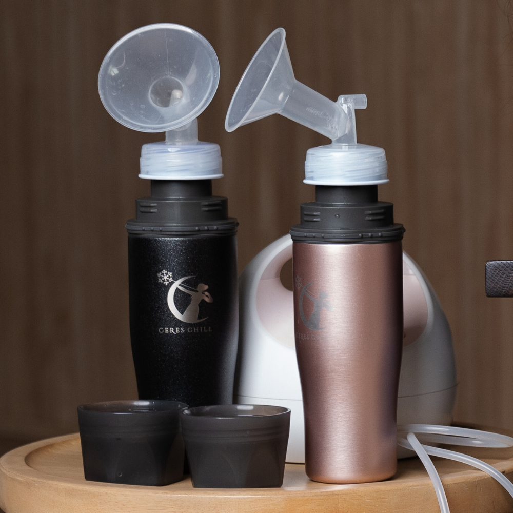Demigoddess Starry Night and Rose Gold breastmilk cooler, stylish and portable breastmilk chiller with breast milk pumps attached.