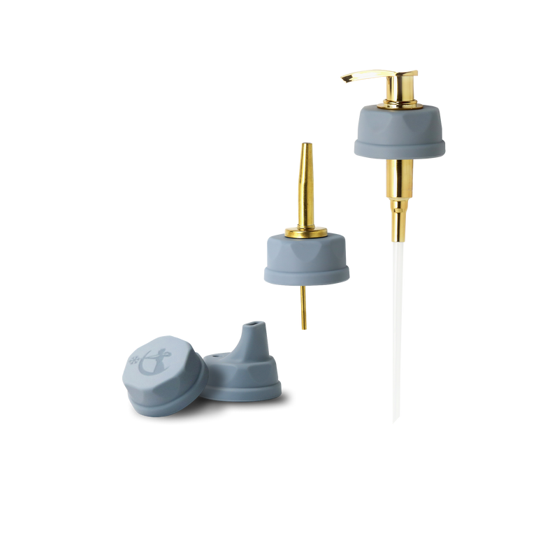 A set of Ceres Chill Bloom Bottle Accessories including an oil and soap dispenser with two lids. 