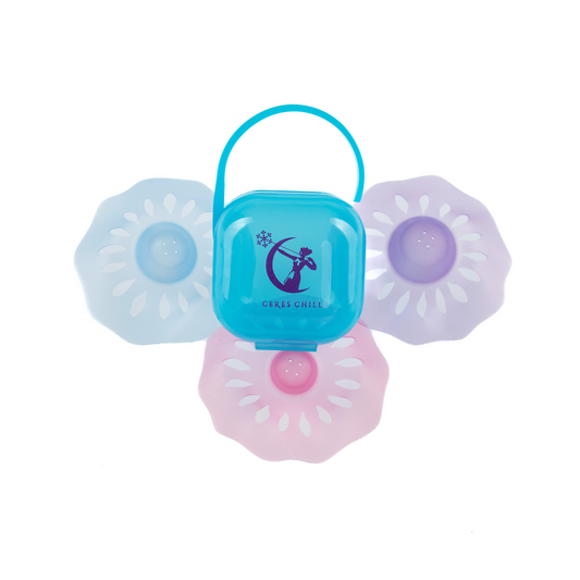 Blue, Purple, and Pink Nipple Shield Protectors with a Ceres Chill Case on a white background. 