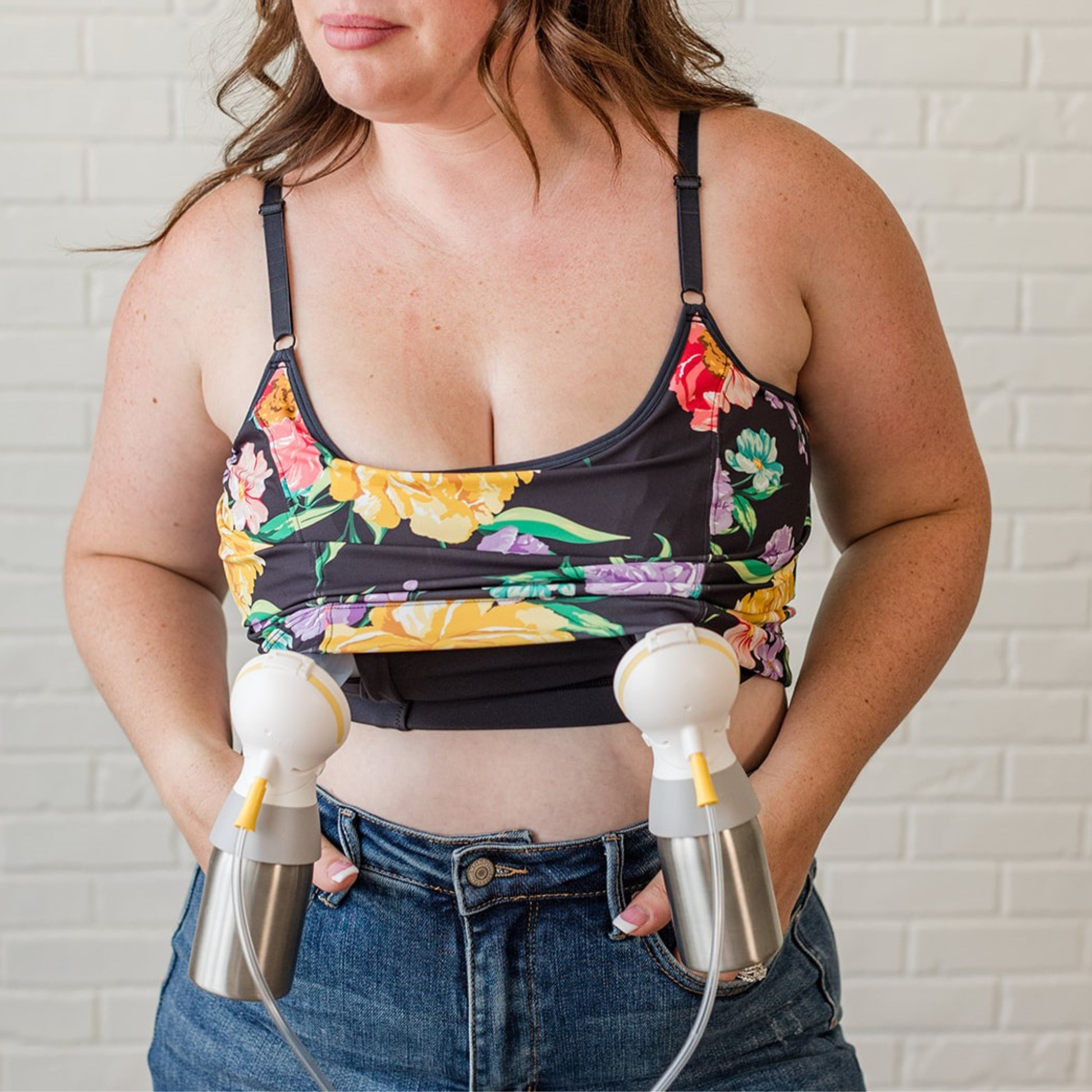 A woman using her Ceres Chill Inner Chamber to double pump breast pumping. 